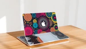 Enhance your MacBook skins with fashionable designs showcased on a sleek laptop.